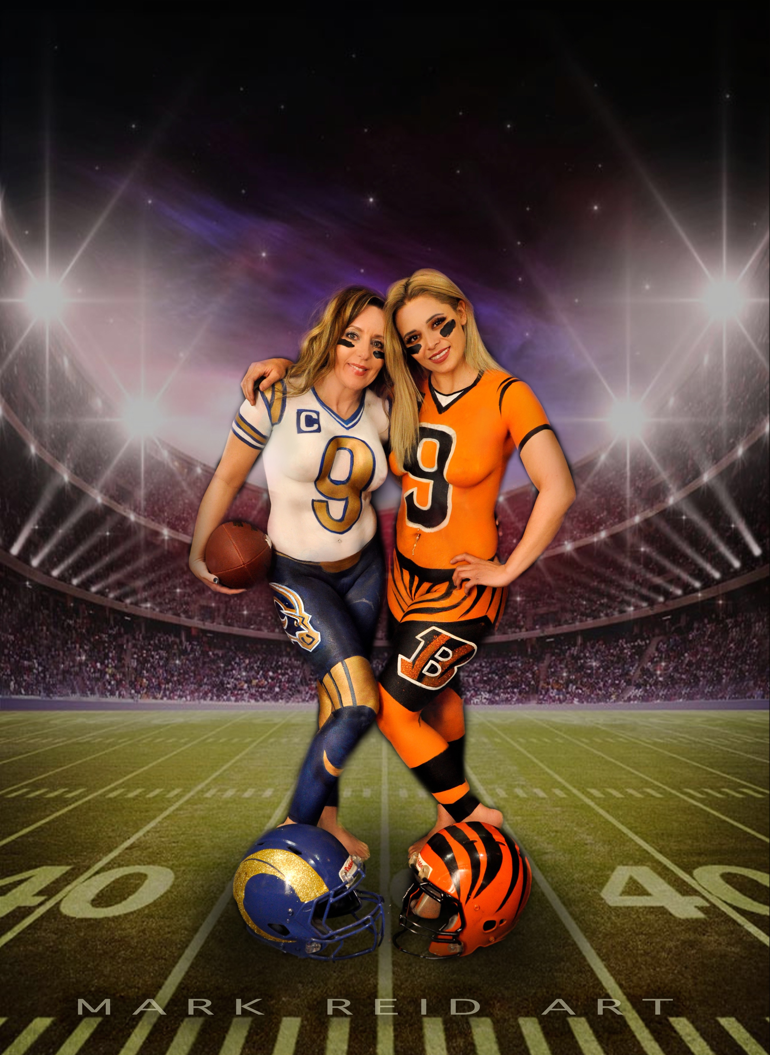 Two women in full body paint that reflects the Big Bowl of 2022.  Both are in opposing team colors appearing before a football field background