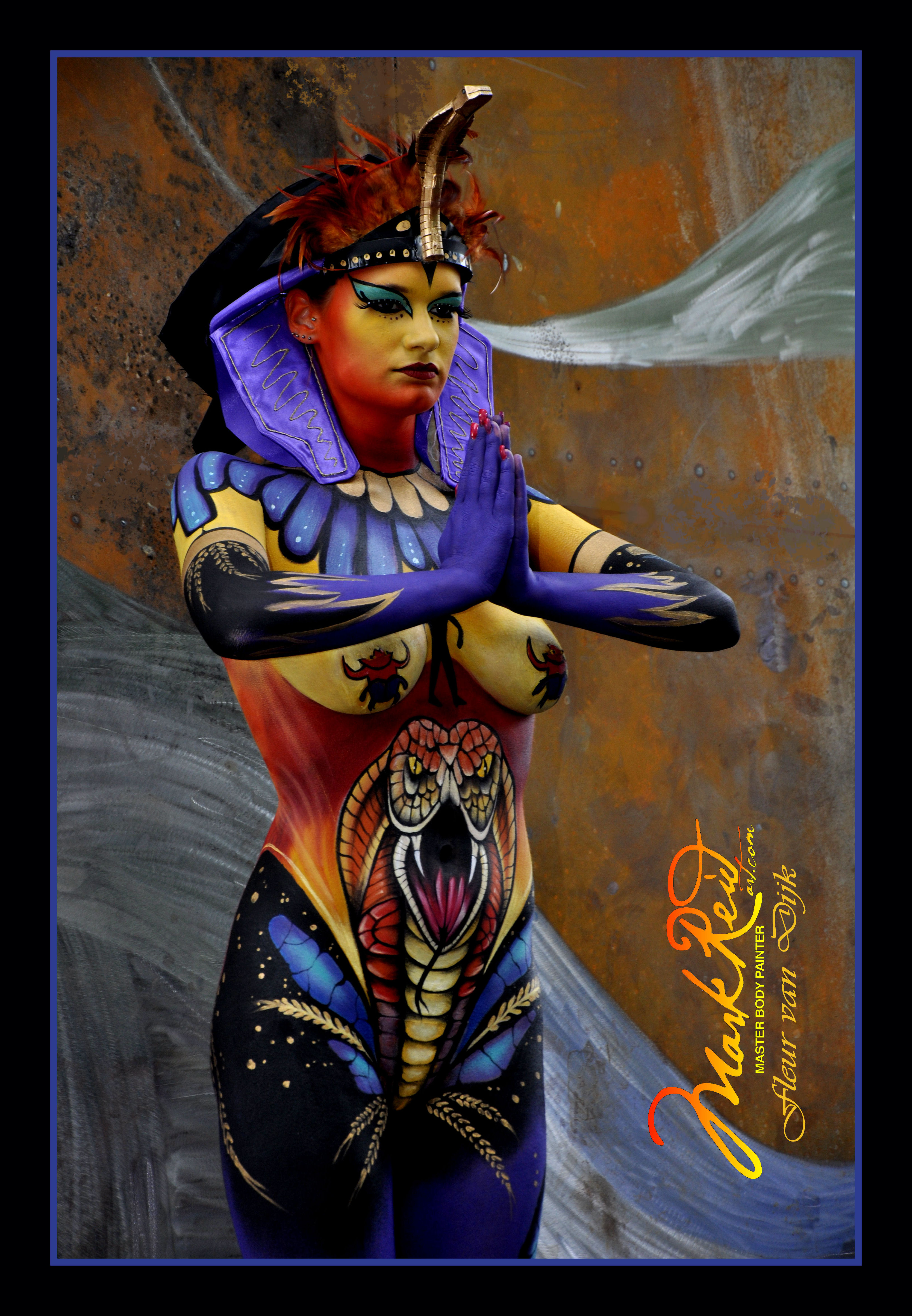 Very colorful full body painting on a woman in an ancient Egyptian style including a headdress