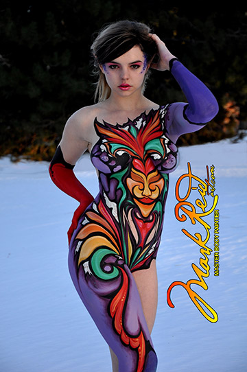 Brunette woman in very colorful full body paint